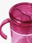 Close-up of a pink tumbler with a handle on a white background